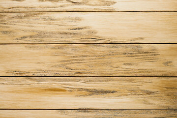 Empty rustic wooden table background. Old wood table with dark blurred background. Mock up.