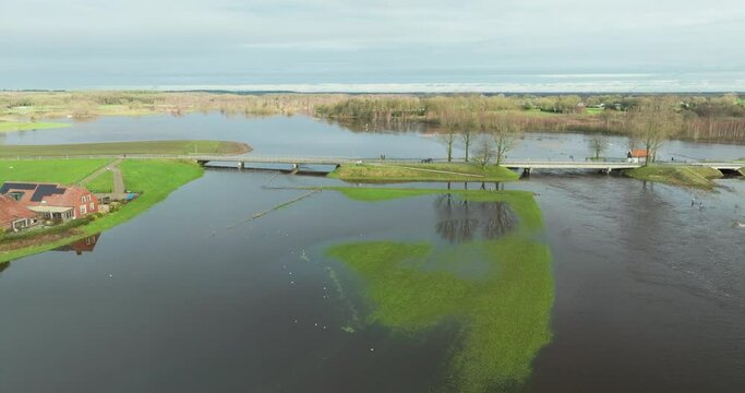 Aerial view of bridge and weir during high water of river Vecht, Diffelen, Vechtdal, Overijssel, Netherlands.