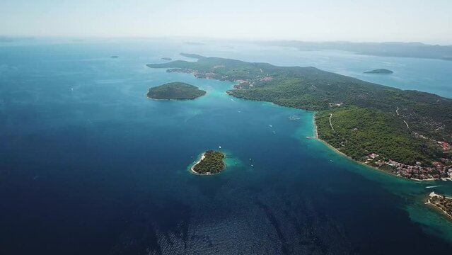 Aerial view of beautiful blue shoreline village on Ugljan Island, Croatia.
