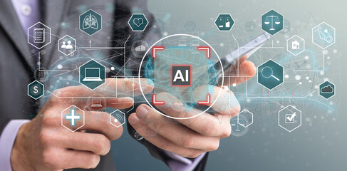 Artificial intelligence concept businessman holding ai on computer screen to using for in document management system and data analysis works