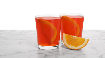 Aperol spritz cocktail and orange slices in glasses on marble table against white background