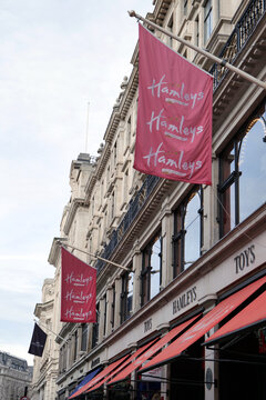 Exterior of Hamleys toy shop on Regent Street with their flags flying to attract customers.