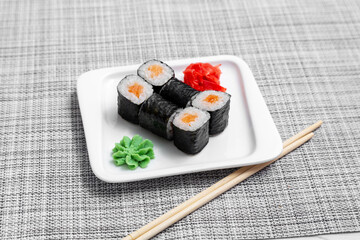 Sushi, maki rolls with salmon.