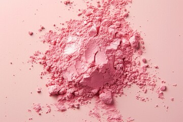 Pink powder on beige background.