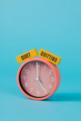 text quiet quitting and pink clock - 741497309