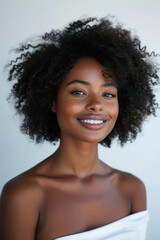 Young adult African American woman posing for beauty portrait. Pretty smiling happy Black girl model pampering smiling on background advertising healthy skin care cosmetics. Face skincare concept .