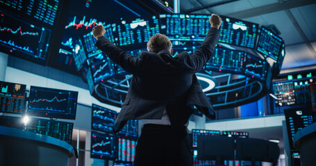 Successful Stock Exchange Trader Celebrating a Profitable Sale. Professional Broker Excited About...