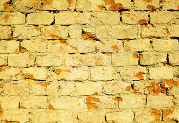 Yellow brick wall texture background.