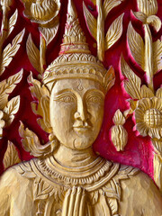 golden carving of buddha in temple Thailand