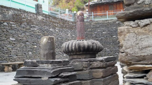 Ancient Stone Shiva Linga Sculptures at Lakhamandal Shiva Temple: Ruins