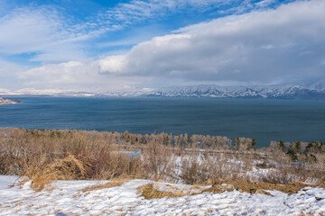 Armenia, February 2024. View of Lake Sevan and mountains