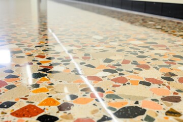 closeup of shiny new terrazzo floor with multicolored chips