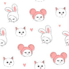 Vector seamless pattern with funny cat faces isolated on white. Hand-drawn texture with cute kittens for textile or wrapping design