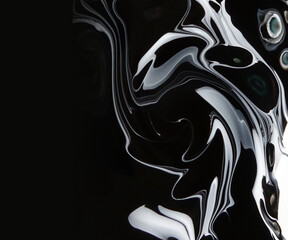 Beautiful monochromatic fluid art with black and white acrylic paint
