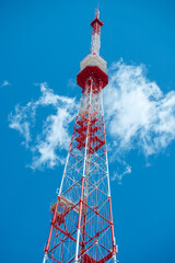 Communication tower against the blue sky.