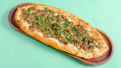 Turkish meat pide top view isolated