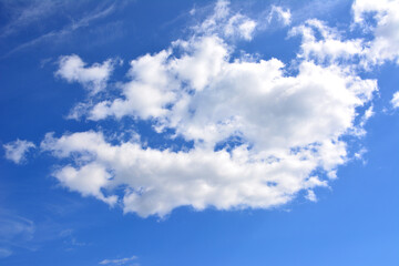 Naklejka na ściany i meble white cloud in the dark blue sky wallpaper