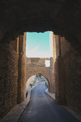 Romantic backstreet, side street and alleys in historic old town of Ibiza Stadt, Balearic Island with historic Mediterranean style architecture facades, a landmark sightseeing tourist spot in downtown