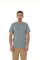Fototapeta premium surprised guy looking at camera on white studio background
