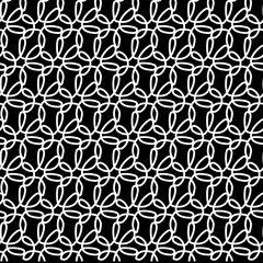Seamless floral pattern in doodle style in white on a black background