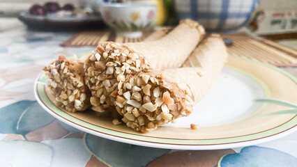 Wafer rolls with condensed milk