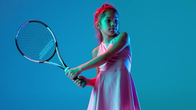 Dynamic collage made of mostly children, athletes of various kind of sports in motion over multicolored background in neon light. Concept of professional sport, action, competition