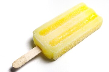 Yellow ice cream stick, isolated over white background