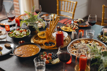 Brunch table setting with tasty delicious food and beverages ready for holiday home party