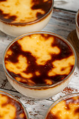 Rice pudding dessert on white wood background. Traditional Turkish cuisine flavors. ramadan dessert. Local name sutlac