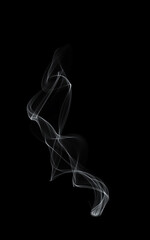 Clear smoke or vapor flowing upward.