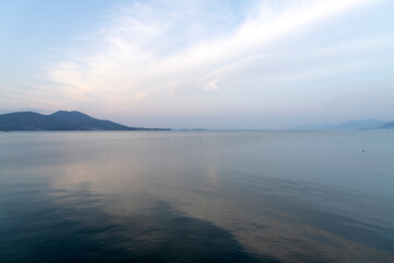 View of the calm sea surrounded by islands