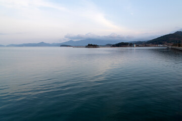 View of the calm sea surrounded by islands