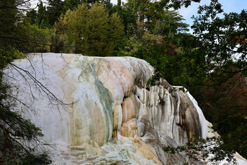 Bagni San Filippo is a small hot spring containing calcium carbonate deposits, which form white concretions and waterfalls. The grotto is open to visitors. Castiglione D'orcia SI, Tuscany, Italy