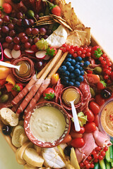 Antipasto platter with meat, chease, fruits, vegetables and nuts. Appetizer, catering food concept - 741618925
