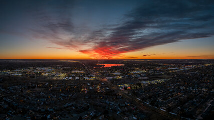 winter sunrise over midtown of Fort Collins, lakes and plains in northern Colorado, aerial panorama
