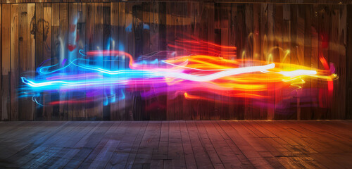 Colourful neon light streaks on a wooden texture in a flowing abstract pattern.
