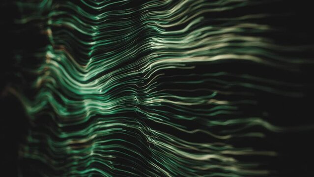 Abstract Swirling And Flowing Lines Background/ 4k animation of an abstract background with waving light stroke patterns and depth of field