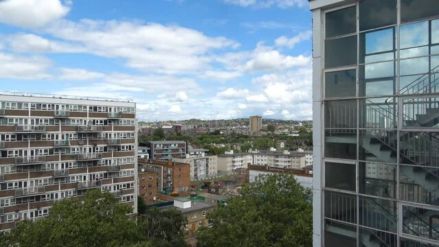 A Beautiful 4K Timelapse from South Kilburn Craik Court Maida vail London UK. 10th floor view of puffy clouds moving across the London skyline 2023