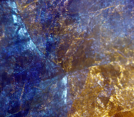 Texture of crumpled sheet of transparent cloth as background 