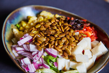 Colorful Gourmet Salad with Roasted Pumpkin Seeds - Eye-Level View