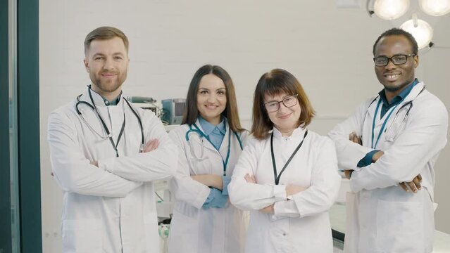 Group of doctors standing together after a successful surgery