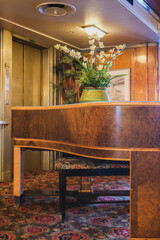 Wood paneled Art Deco interior design architecture inside lounge bar public space onboard ocean...
