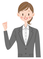 元気なスーツの女性社員　ガッツポーズ　就職　採用