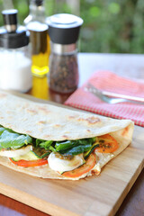 Italian cuisine , Piadina with tomatoes and cheese