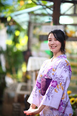 portrait woman with yukata dress in the garden