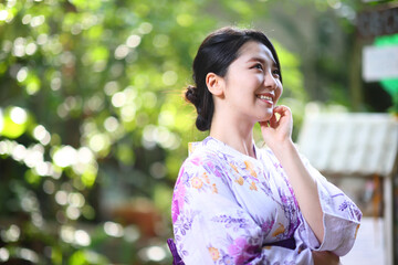 portrait woman with yukata dress in the garden