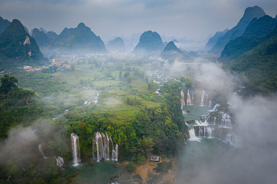 Aerial view of Detian Transnational Waterfalls along the river at Moon Hill Yangshuo valley, Chongzuo City, Yangshuo County, Guilin, Guangxi Zhuang Autonomous Region, China.