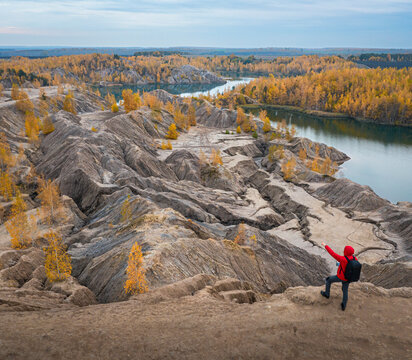 Aerial view of a river with trees in autumn colours in Konduki, Tula region, Russia.