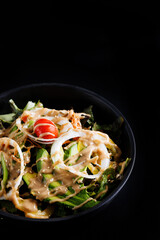 Japanese salad isolated in black background