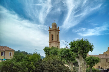 Obraz premium Piana village in Corsica, the church, in a typical street 